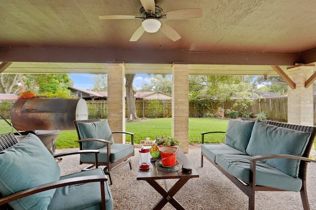 view of patio / terrace featuring ceiling fan and an outdoor living space