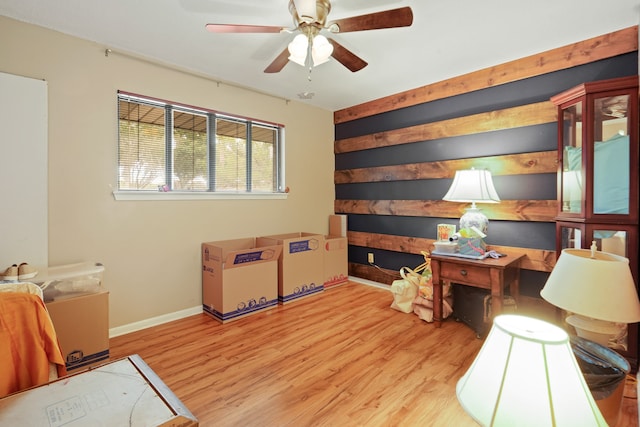 interior space featuring ceiling fan and light hardwood / wood-style floors