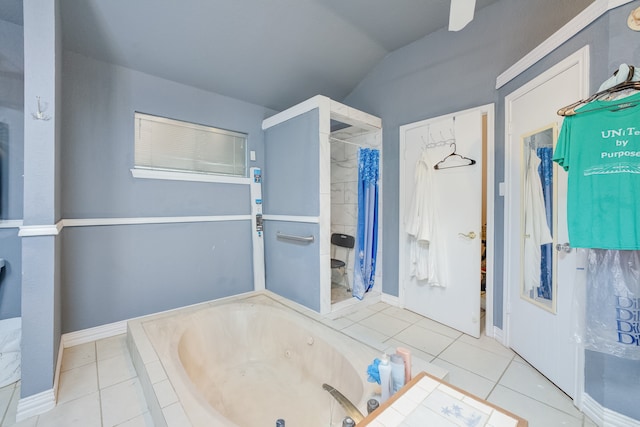 bathroom featuring plus walk in shower, lofted ceiling, and tile patterned floors