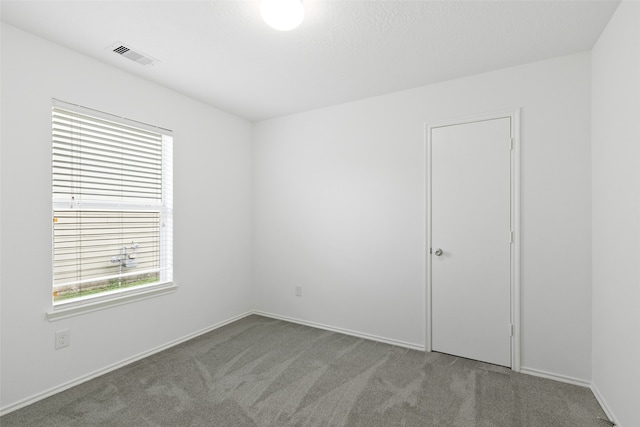 empty room with carpet floors