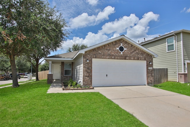 view of front of house featuring a garage and a front yard