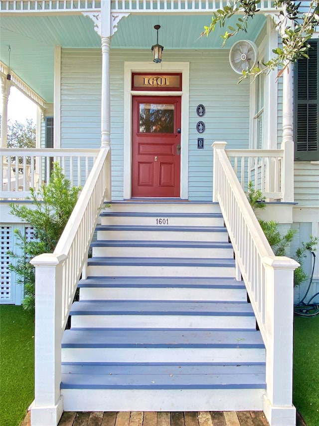 entrance to property with a porch