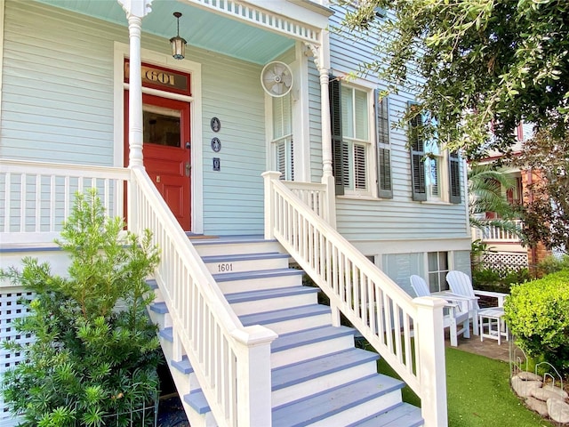 property entrance with covered porch