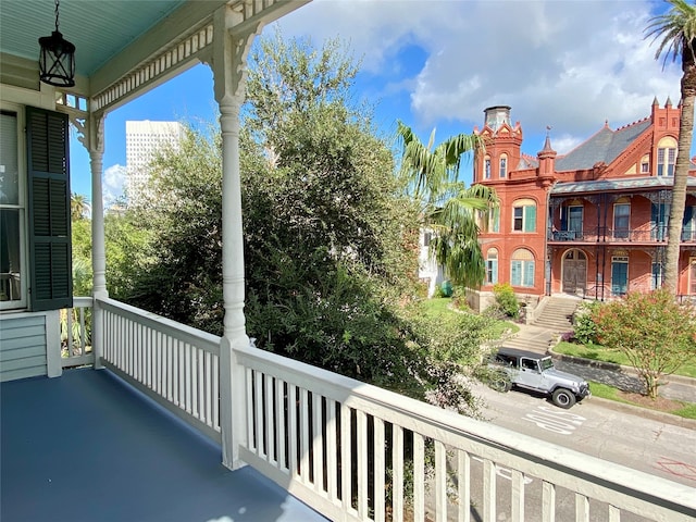 balcony featuring a porch