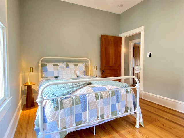 bedroom with light hardwood / wood-style flooring