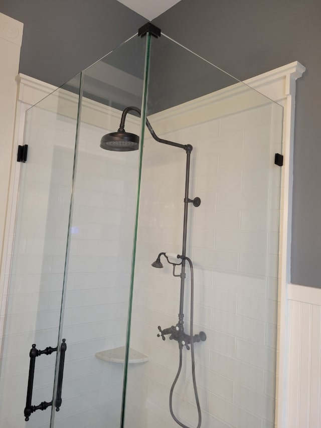 full bathroom featuring a stall shower