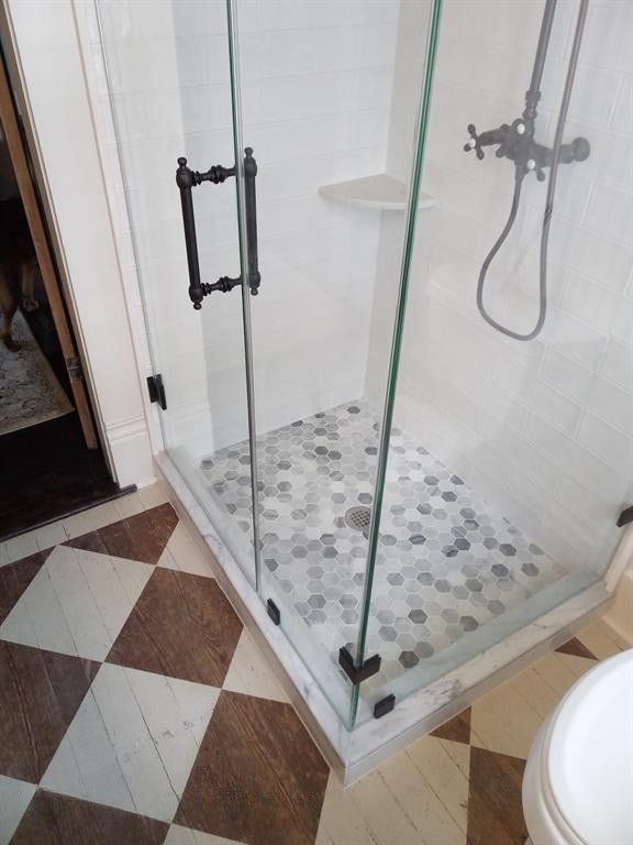 full bathroom with a stall shower