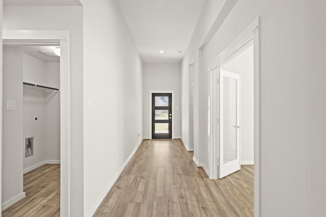 corridor featuring light wood-type flooring