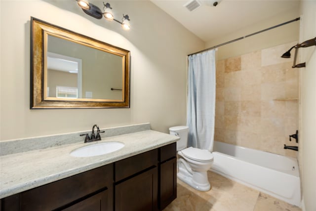 full bathroom with vanity, toilet, shower / bath combo with shower curtain, and tile patterned floors