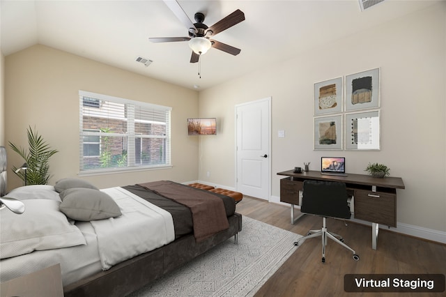 bedroom featuring wood-type flooring, lofted ceiling, and ceiling fan