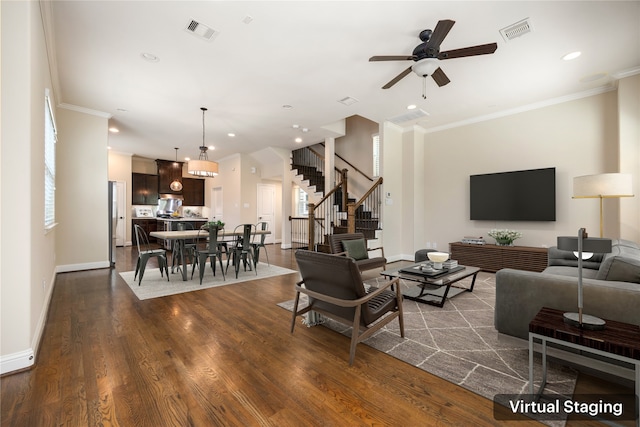 living room featuring ceiling fan, crown molding, and dark hardwood / wood-style flooring