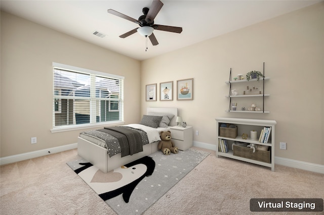 carpeted bedroom featuring ceiling fan