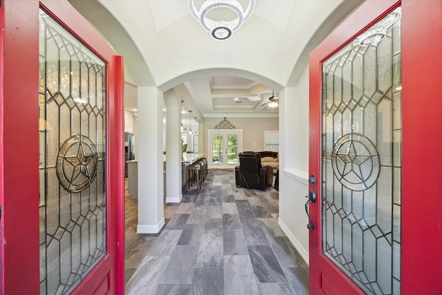 entryway with beam ceiling, french doors, ceiling fan, crown molding, and coffered ceiling