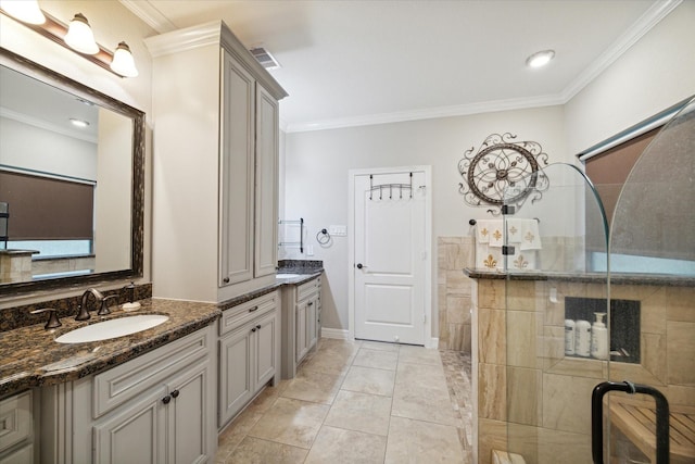 bathroom featuring a shower with shower door, crown molding, and tile patterned flooring