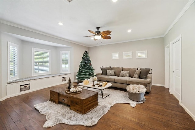 living room with ceiling fan, dark hardwood / wood-style flooring, and ornamental molding