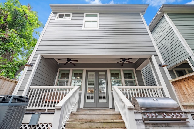 view of front of property featuring central AC unit and ceiling fan