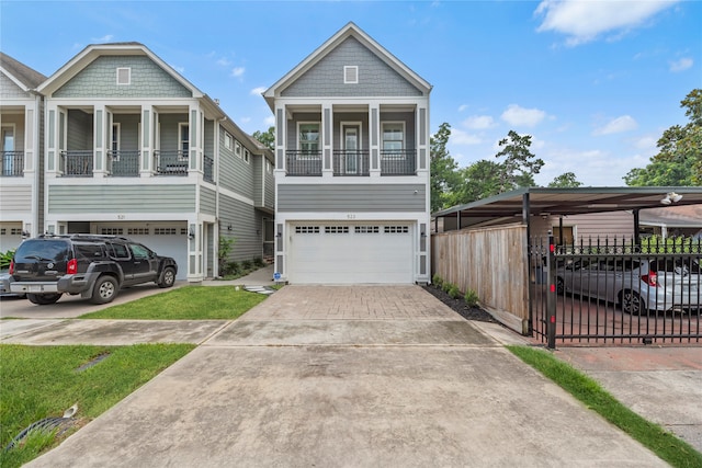 view of front facade featuring a garage and a balcony