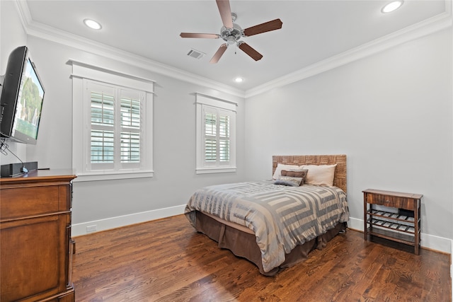 bedroom with crown molding, ceiling fan, and dark hardwood / wood-style flooring