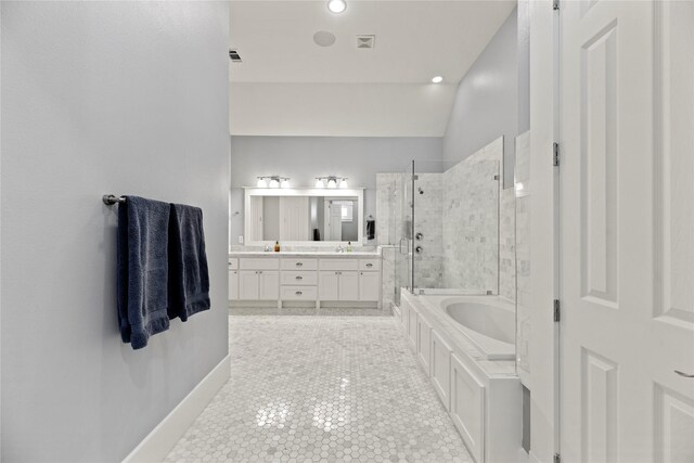 bathroom with lofted ceiling, tile patterned flooring, vanity, and shower with separate bathtub