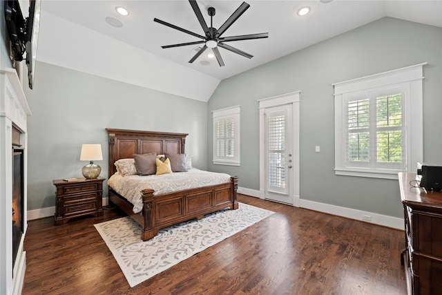 bedroom with lofted ceiling, dark hardwood / wood-style flooring, ceiling fan, and access to outside