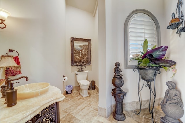 bathroom with sink and toilet