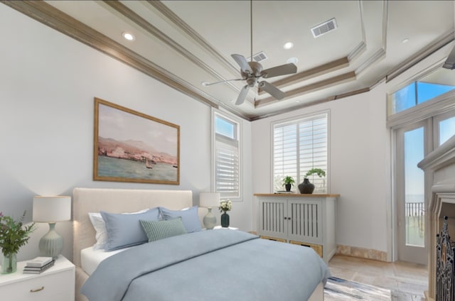 bedroom with ceiling fan, light tile patterned floors, a raised ceiling, and ornamental molding