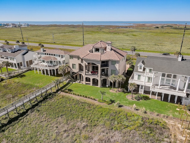 bird's eye view with a water view and a rural view