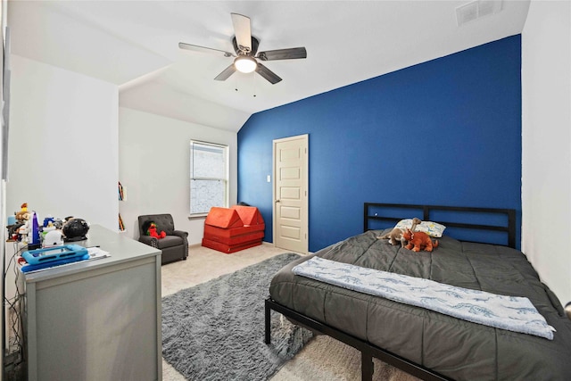 bedroom featuring lofted ceiling, ceiling fan, and carpet floors