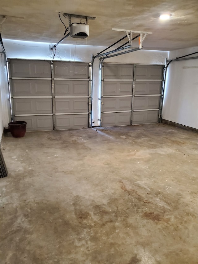 garage featuring a garage door opener