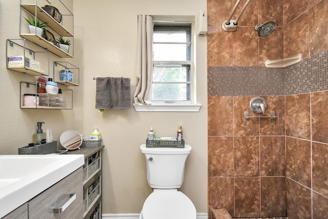 5522 Cannonway Dr, Houston, TX 77032 - full bathroom with vanity, toilet, and tiled shower