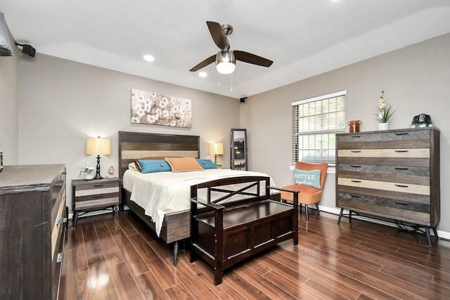 bedroom featuring ceiling fan and dark hardwood / wood-style flooring