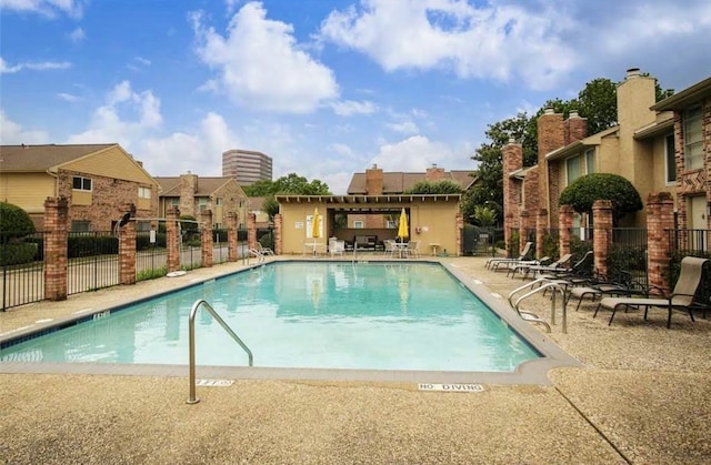 view of pool featuring a patio