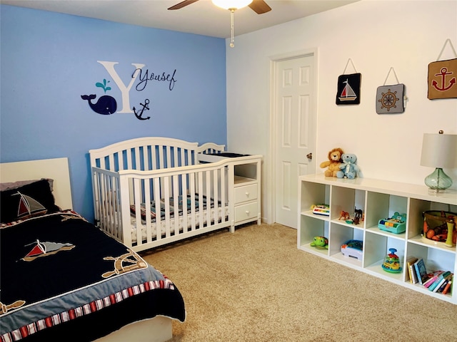 carpeted bedroom featuring ceiling fan