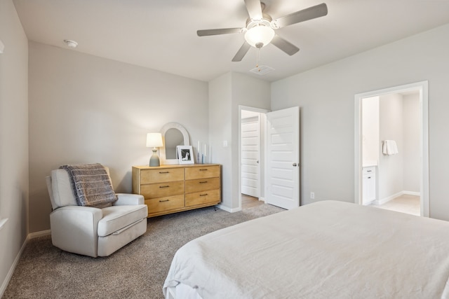 bedroom featuring ensuite bath, ceiling fan, and light carpet