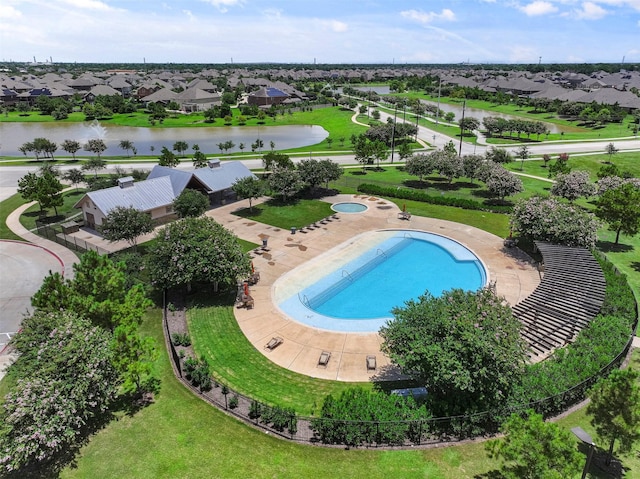 view of pool featuring a water view