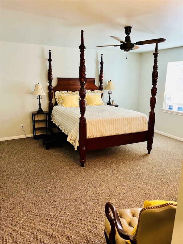 bedroom featuring ceiling fan and carpet