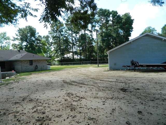 view of yard with fence