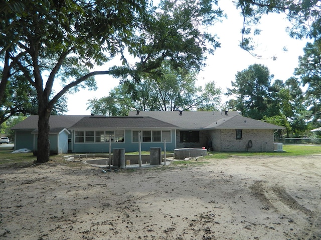 view of front facade featuring a sunroom