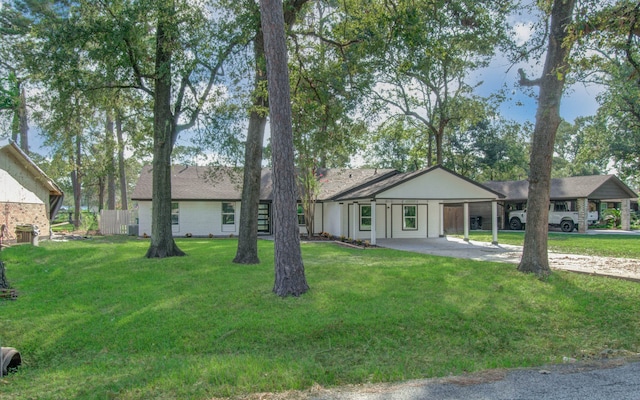 ranch-style home featuring a front yard