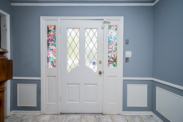 foyer entrance with crown molding