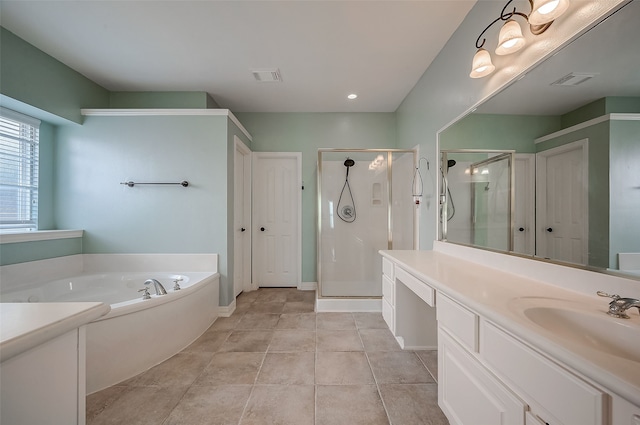 bathroom featuring tile patterned floors, vanity, and plus walk in shower