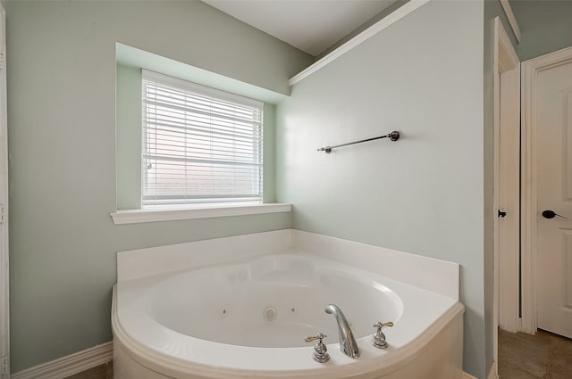 bathroom featuring a washtub