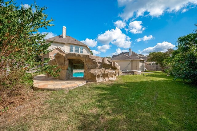 20807 Twisted Leaf Dr, Cypress, TX 77433 - back of house with a chimney