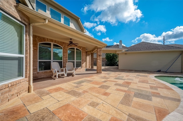 view of patio featuring ceiling fan