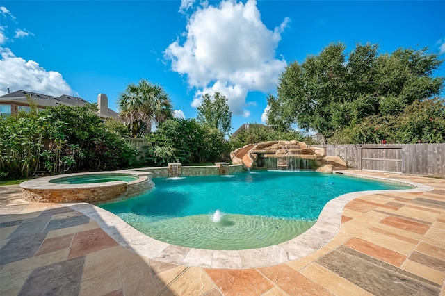 20807 Twisted Leaf Dr, Cypress, TX 77433 - view of swimming pool featuring a patio, a fenced backyard, and a pool with connected hot tub