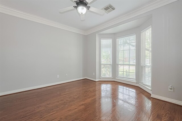 20807 Twisted Leaf Dr, Cypress, TX 77433 - unfurnished room featuring ceiling fan, baseboards, crown molding, and dark wood-style flooring