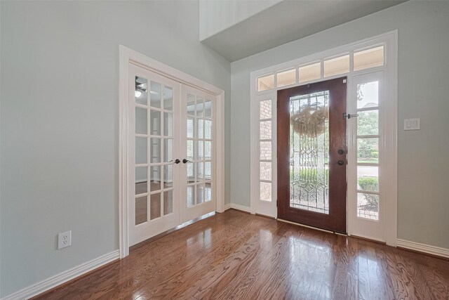 20807 Twisted Leaf Dr, Cypress, TX 77433 - foyer entrance featuring french doors, wood finished floors, and healthy amount of natural light