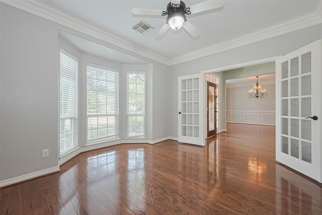 20807 Twisted Leaf Dr, Cypress, TX 77433 - spare room with a chandelier, french doors, crown molding, wood finished floors, and baseboards