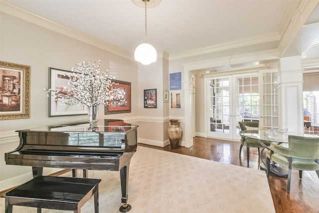 misc room with ornamental molding, decorative columns, and dark hardwood / wood-style flooring