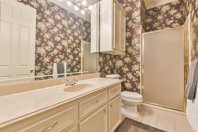 bathroom with vanity, toilet, an enclosed shower, crown molding, and tile patterned flooring